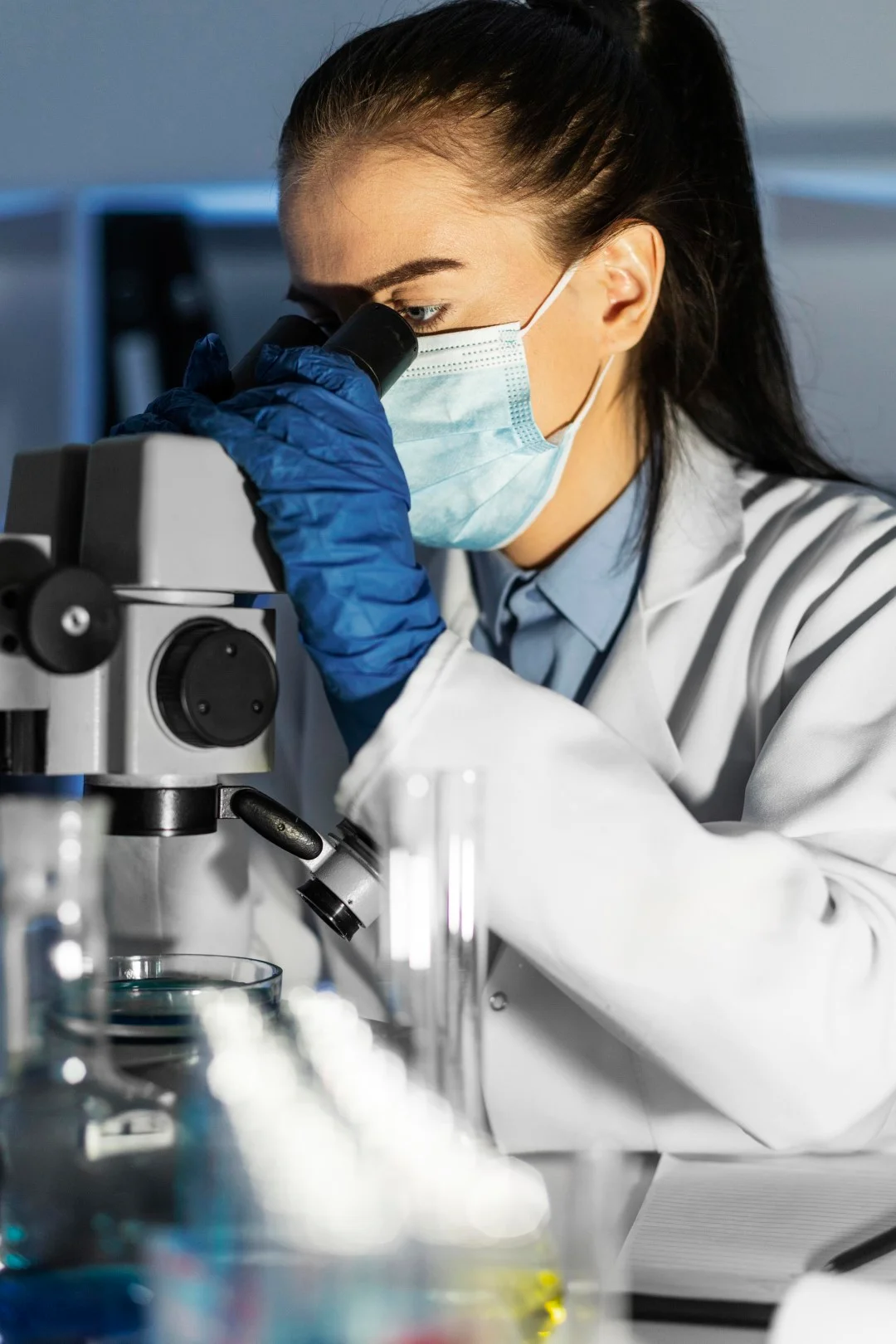 close up woman working with microscope Buyuk