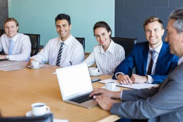 portrait business people sitting conference room meeting office Buyuk e1730469862709